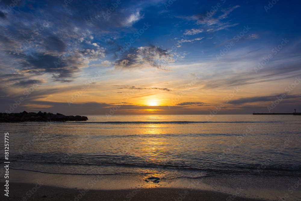Panoramic views of the sunrise with spectacular sky over the sea. Panoramic views of the sunrise with spectacular sky over the sea.