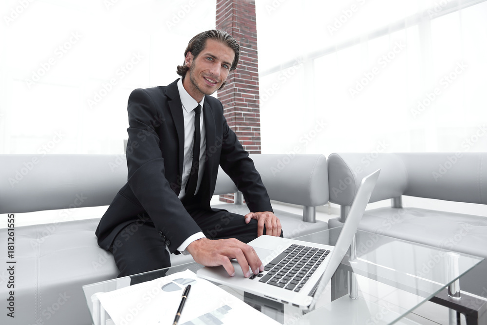 successful businessman working in his office. successful businessman working in his office.
