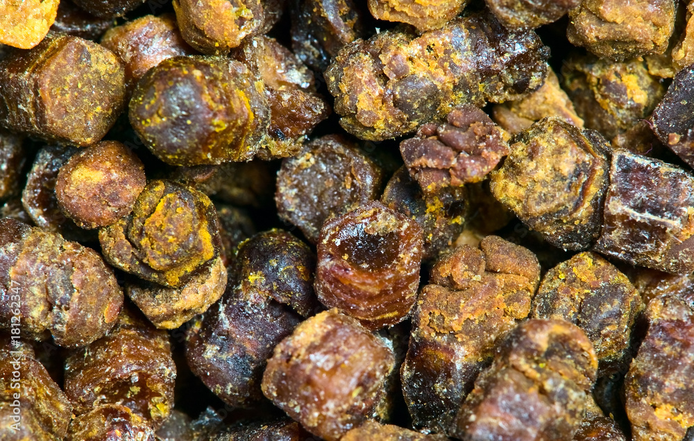 Propolis granules texture, bee product Propolis granules texture, bee product