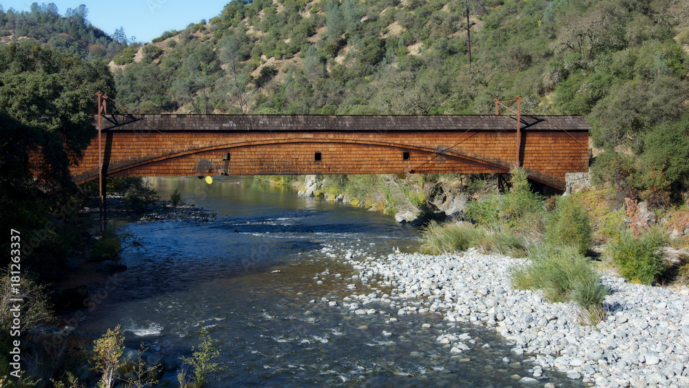 Side view of the bridgeport Covered Bridge at South Yuba River in California, USA. This bridge has the longest clear span of any surviving covered bridge in the world