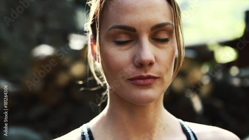 Woman doing Yoga in a Forest