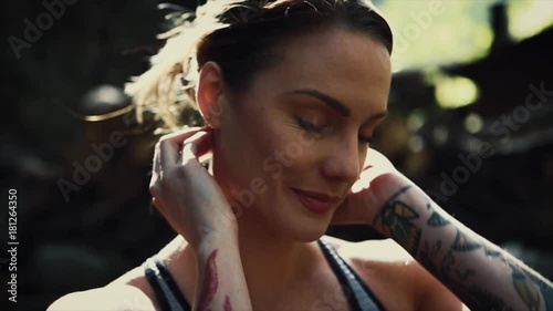 Woman doing Yoga in a Forest