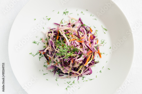 coleslaw salad decorated with dill