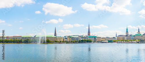 View of the old town in Hamburg behind binnenalster lake, Germany photo