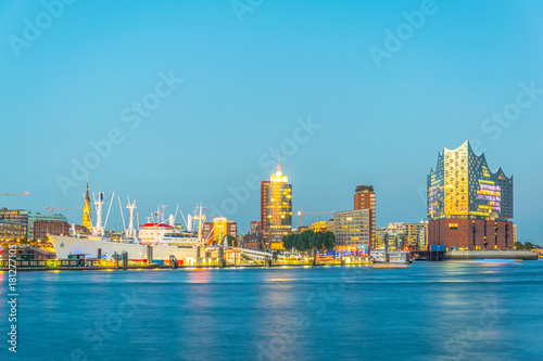 Night view of the port of hamburg with the elbphilharmonie building, Germany. photo