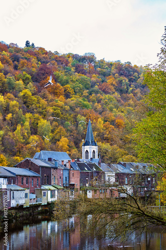 View of Vesdre river and church of Saint Francois Xavier in Belgian town of Chaudfontaine, Wallonia