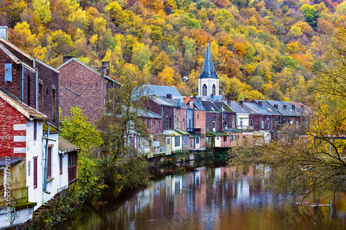 Vesdre river and church of Saint Francois Xavier in Belgian town of Chaudfontaine, Wallonia photo