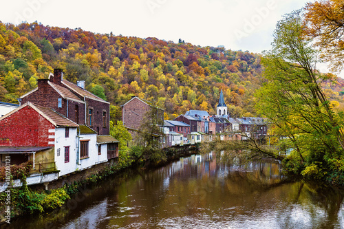 View of Vesdre river and church of Saint Francois Xavier in Belgian town of Chaudfontaine, Wallonia