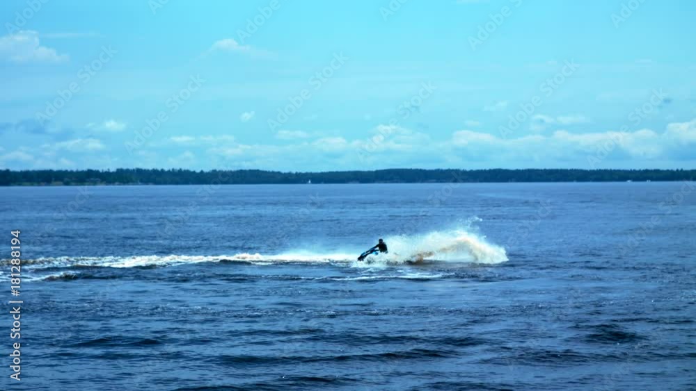 Man on jetski running on the water Man on jetski running on the water
