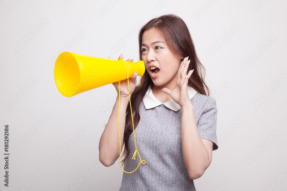 Beautiful young Asian woman announce with megaphone. Beautiful young Asian woman announce with megaphone.