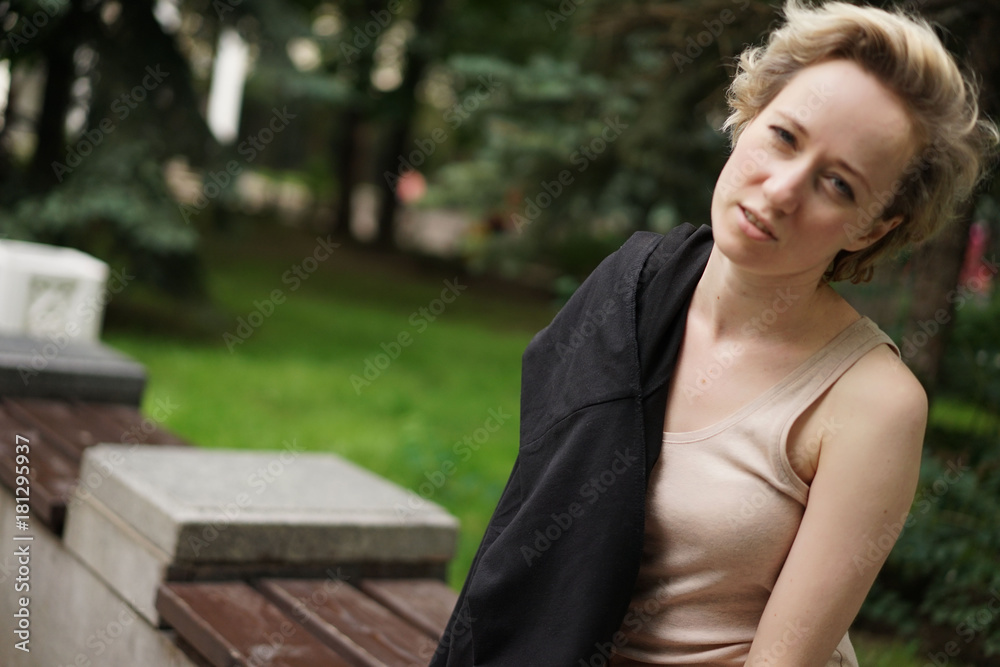 portrait of a woman in the park portrait of a woman in the park