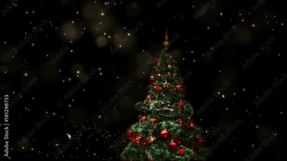 Decorated blinking Christmas tree with red and golden decorations and flashing garlands shining in the starry night Decorated blinking Christmas tree with red and golden decorations and flashing garlands shining in the starry night