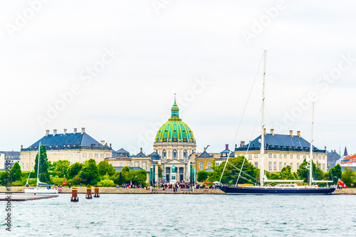 Frederik's Church known as The Marble Church and Amalienborg palace with the statue of King Frederick V in Copenhagen, Denmark photo