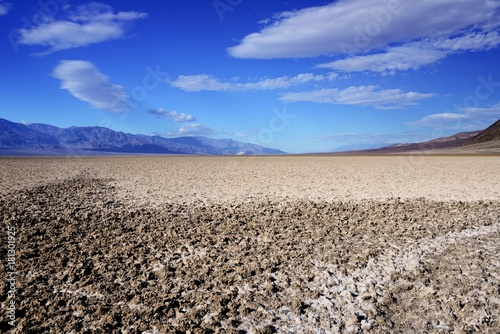 Dry lake bed below sea level in an endorheic basin at Badwater Basin, Death Valley National Park, California