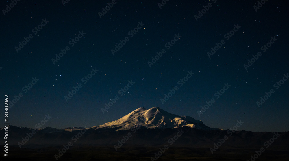 Night sky over Mount Elbrus - highest mount in Europe