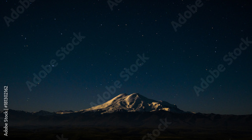Fototapeta Naklejka Na Ścianę i Meble -  Night sky over Mount Elbrus - highest mount in Europe