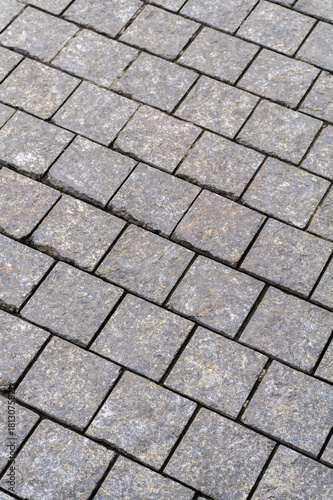 Stone tiles pavement texture. Footpaths pavement in park.