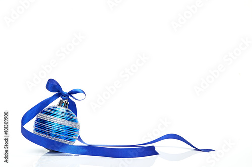 Blue Christmas ball with ribbon bow on white background photo