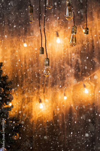 Christmas tree background, bright hanging lamp, New year. holiday