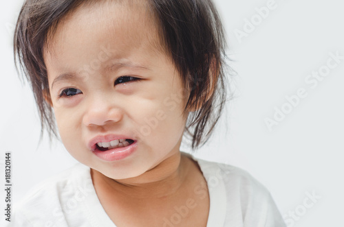 Closeup of asian little girl crying