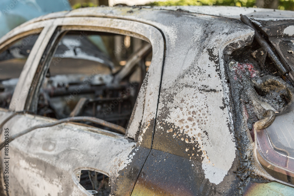 Close-up of Burned Out Car on the Street