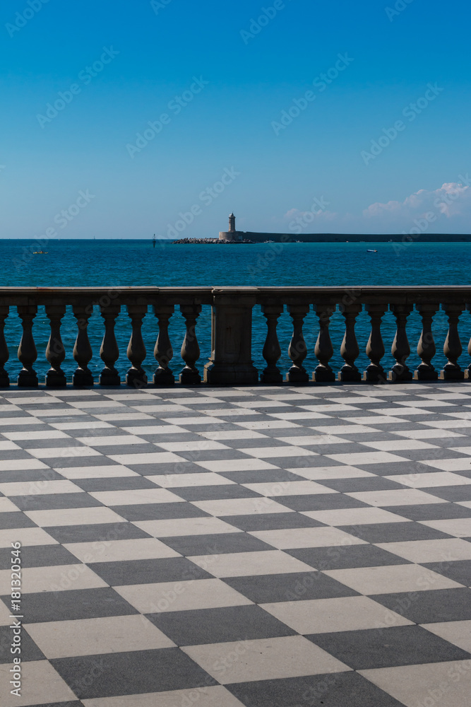 Livorno' s Mascagni Terrace and White LightHouse in background,