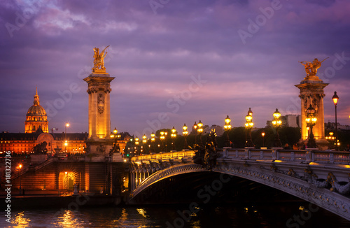 famouse Alexandre III Bridge at violet night, Paris, France, retro toned