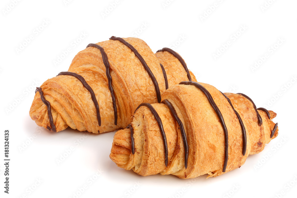 croissant decorated with chocolate sauce isolated on white background, top view croissant decorated with chocolate sauce isolated on white background, top view