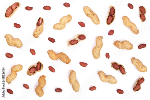 Peanuts with shells isolated on white background, top view. Flat lay pattern