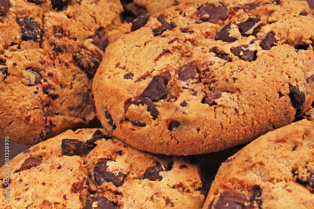 American cookies. Biscuits texture. American style cookie background pattern wallpaper for any concept. Chocolate and biscuit snacks. Foog photo. American cookies. Biscuits texture. American style cookie background pattern wallpaper for any concept. Chocolate and biscuit snacks. Foog photo.