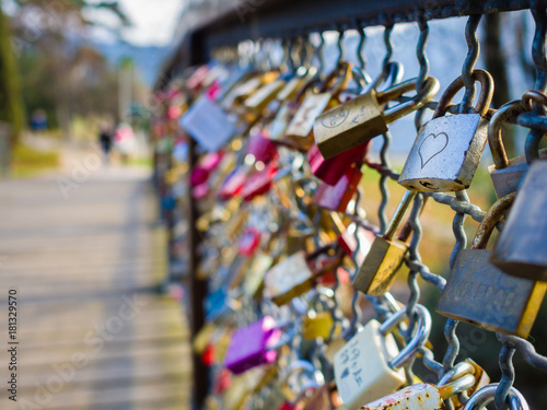 Love padlocks on a fence