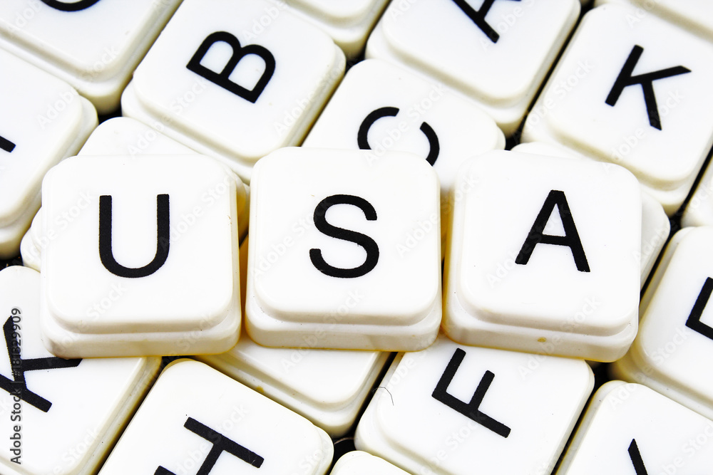 Usa text word crossword. Alphabet letter blocks game texture background. White. Usa text word crossword. Alphabet letter blocks game texture background. White.