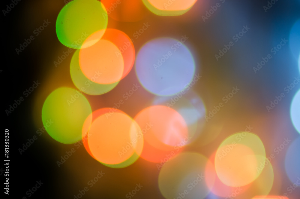 Obraz premium Christmas background. Festive abstract background with bokeh defocused lights