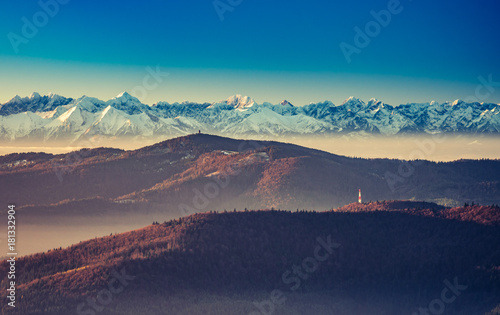 Fototapeta Naklejka Na Ścianę i Meble -  panorama over Gorce to snowy Tatra mountains in the morning, Poland landscape
