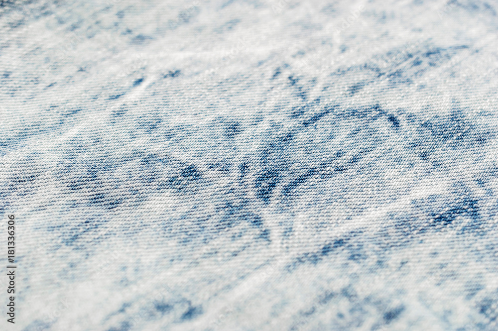 Texture of light blue jeans. Close up. Abstract background.