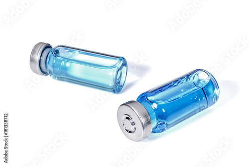 Medicals vials with blue vaccine photo