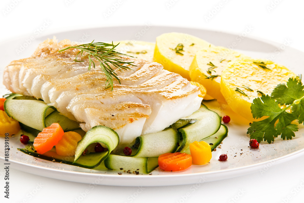 Fried fish with potatoes on white background Fried fish with potatoes on white background