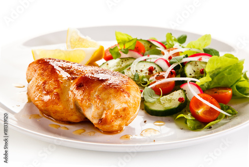 Grilled chicken fillet on white background