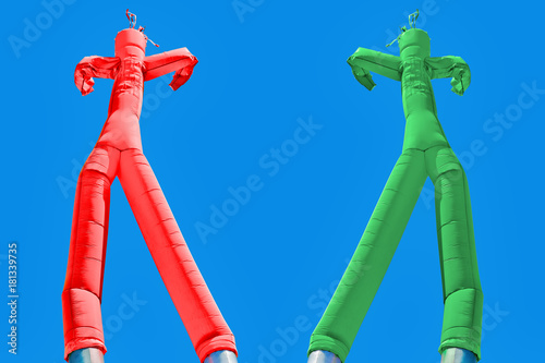 Two inflatable man. Green and Red. Choices concept