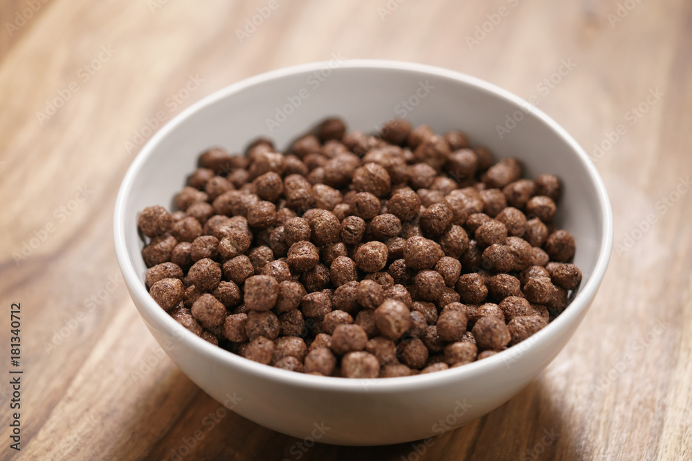 chocolate cereal balls in white bowl for breakfast chocolate cereal balls in white bowl for breakfast