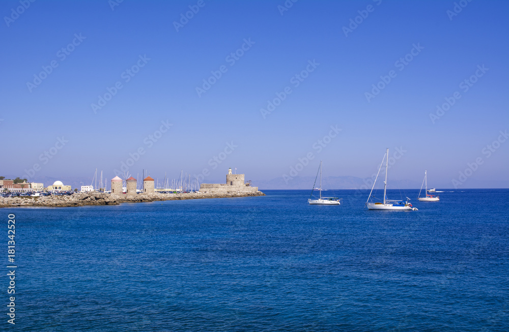 Wind Mills and Mandraki harbour view, Rhodes, Greece