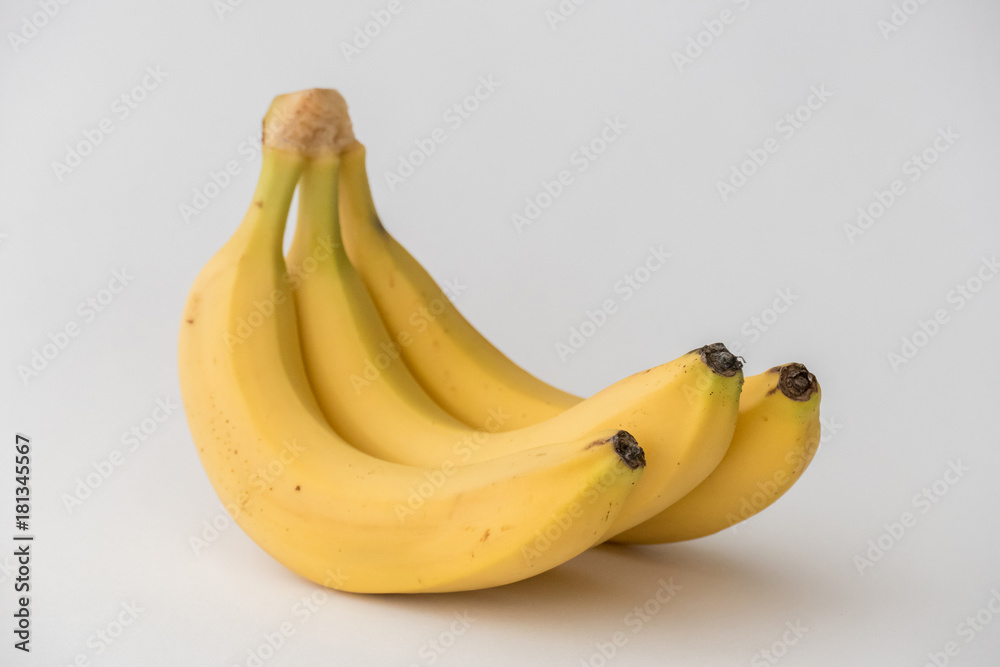 Bunch of bananas isolated on white background / Bunch of ripe yellow bananas isolated on white background