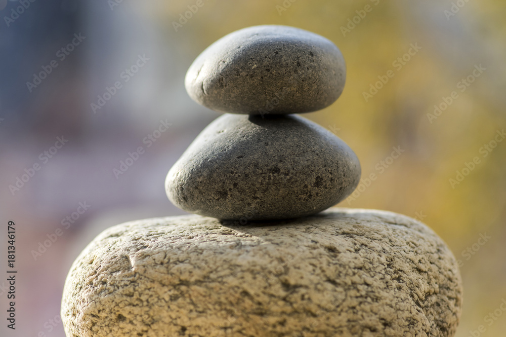 Three zen stones pile, white and grey meditation pebbles tower Three zen stones pile, white and grey meditation pebbles tower