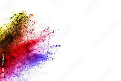 Abstract multicolored powder splatter on black background Freeze motion of color powder splash. Color dust explosion on background.