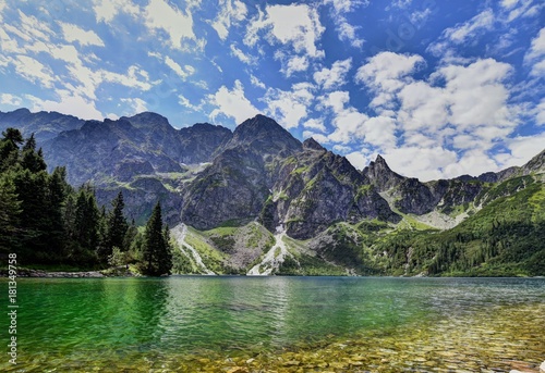 Fototapeta Naklejka Na Ścianę i Meble -  Green water of Morskie Oko lake in summer, Tatra Mountains, Poland