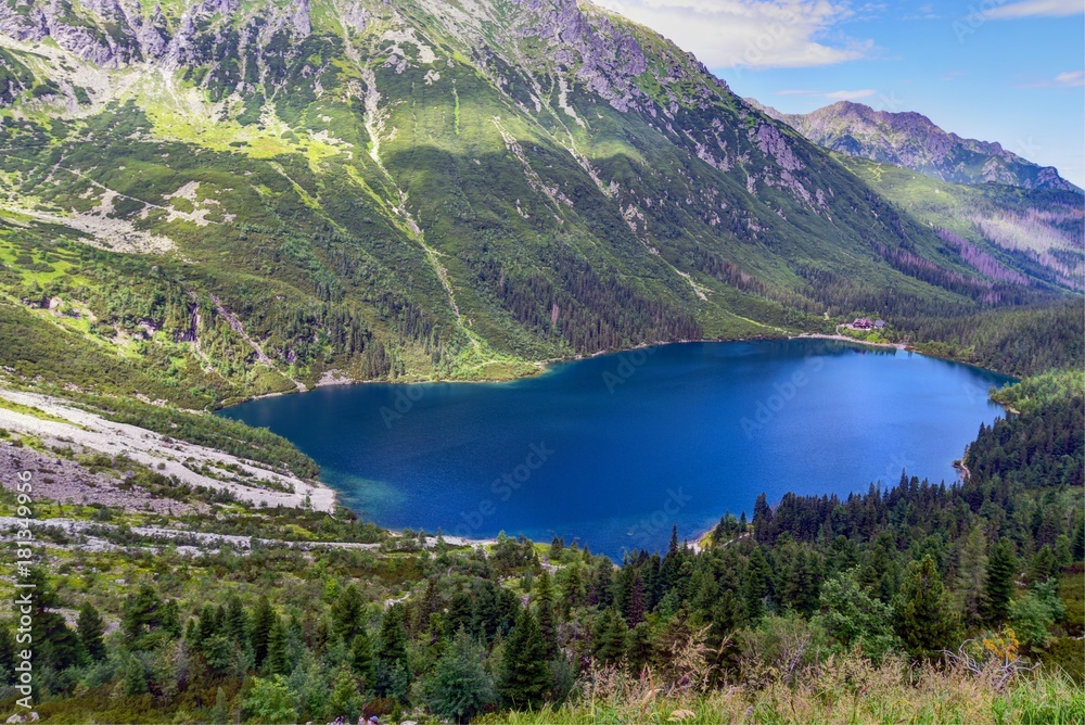 Green water of Morskie Oko lake in summer, Tatra Mountains, Poland