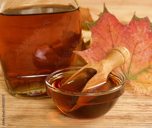 maple syrup on wooden background