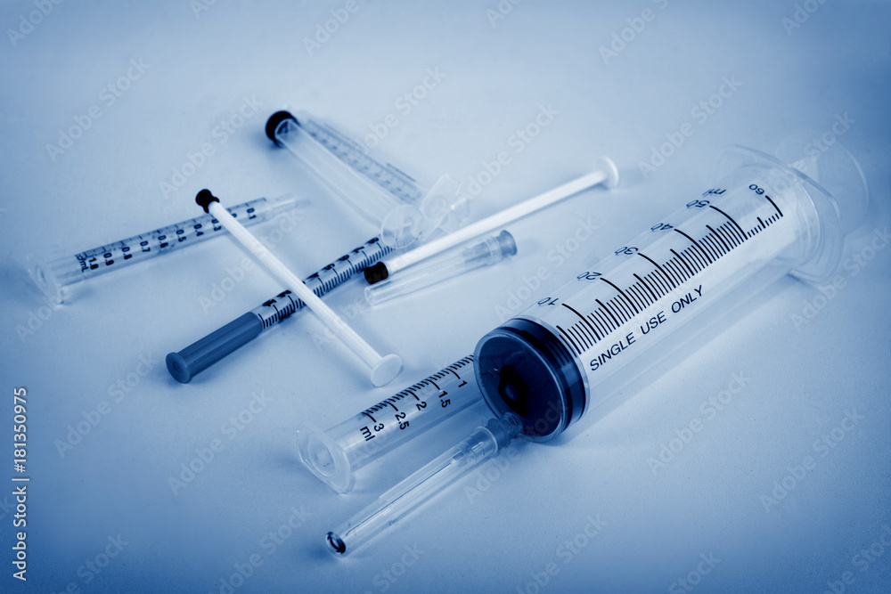 medical ampoules and syringe.(bluetone color) medical ampoules and syringe.(bluetone color)