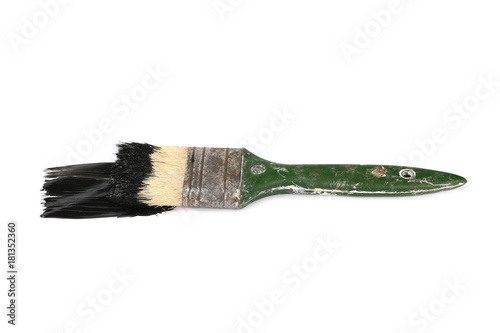 Old paint brush with black color isolated on white background