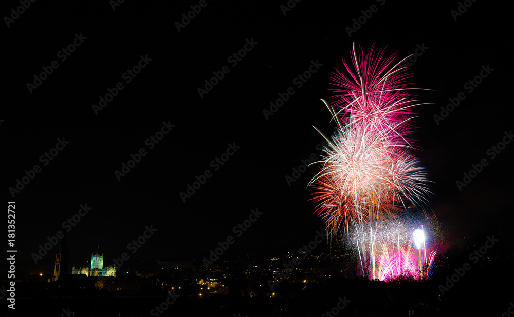 Fireworks over Bath, with Abbey. A composite image of fireworks being let off to celebrate bonfire night in Bath, England, UK Fireworks over Bath, with Abbey. A composite image of fireworks being let off to celebrate bonfire night in Bath, England, UK